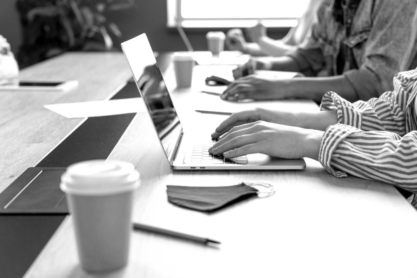 Professional team collaboration in modern financial office setting